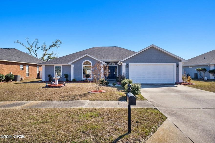 Discover the warmth and elegance of this beautiful family home, ideally located in the serene neighborhood of The Hammocks. Just a short drive from the area's top-rated schools, this residence combines convenience with the tranquility of suburban living. The heart of the home, the kitchen, is equipped with modern stainless steel appliances and offers abundant storage, making meal preparation a delight. Enjoy the spacious living room, where crown moulding adds a touch of sophistication, and a large gas-burning fireplace creates a cozy atmosphere for family gatherings. Large windows frame the view to the expansive backyard, inviting natural light and the beauty of the outdoors in. The primary bedroom is a true retreat, featuring spacious his and hers walk-in closets, elegant tray ceilings, and a luxurious whirlpool tub, perfect for unwinding after a busy day. Outside, the backyard is an entertainer's dream, boasting a large deck and plenty of green space for activities, all fully fenced for privacy and security. Additionally, a storage building tucked away in the backyard provides a discreet solution for organizing supplies and keeping the outdoor area clutter-free. This home is pet-friendly, welcoming dogs to join in the family fun, though it's worth noting that cats are not permitted. 
The home also features a brand new HVAC system!

Don't let this opportunity pass you by. Call today to schedule a viewing of this beautiful home in The Hammocks and take the first step towards creating unforgettable family memories in your new home.