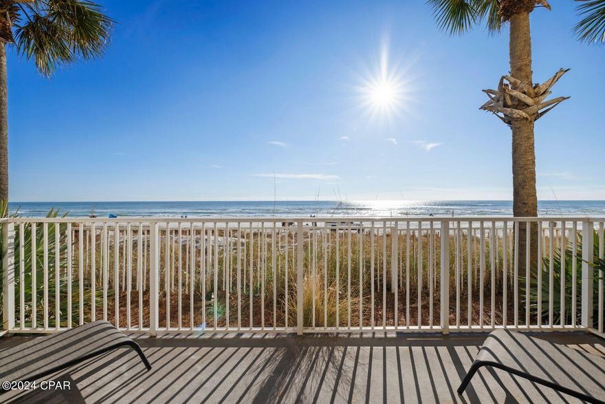 Gulf front ground floor with fantastic views! Walk out your front door and walk right over to the pool, hot tub & tiki bar! So easy and convenient to enjoy the grand resort amenities at The Shores. No elevator wait here!. This 1 bedroom, 2 bath condo includes a bunk nook for the kids! This highly desirable ''I'' floorplan has a gulf front living/dining area, beautiful upgraded kitchen with QUARTZ counter tops, porcelain plank wood grain tile throughout the entire condo and it is being sold fully furnished and rental ready. The Shores of Panama is a tropical resort with amenities including a multi-million dollar 13,966 sq ft gulf front lagoon pool and a gulf front oversized hot tub, beautiful fountains and waterfalls, 2 tiki bars, and exotic tropical landscaping. Amenities also include a large indoor heated pool, indoor hot tub, on site full service spa with sauna and steam rooms, and covered parking. One assigned parking space conveys with this condo. Come view this beauty today!