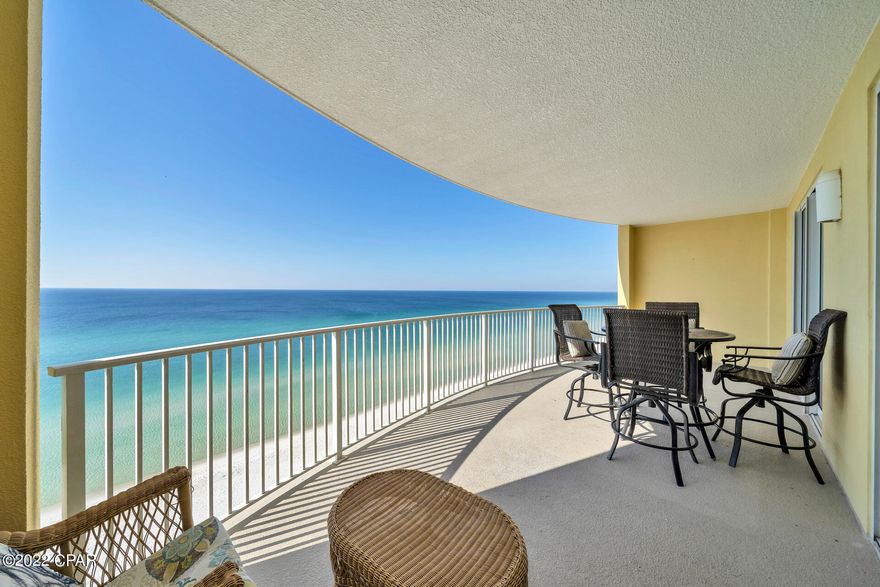 CURRENTLY UNDER CONTRACT, SELLER WILL CONSIDER BACKUP OFFERS. An investors dream- a sought after location, proven rental income, and a projected gross of $75,000 a year!Whether used as an  income producing property, home away from home, or a personal residence, you won't want to miss the stunning views overlooking the Gulf of Mexico in this two-bedroom two bath condo. Decorated in a coastal theme, you'll find shiplap accent walls in the dining area and both bedrooms. The open concept kitchen, dining, and living room areas make a great space for entertaining or just relaxing with family and friends and has been recently updated with easy maintenance flooring and new lighting. The kitchen features granite countertops, tile backsplash, and opens into breakfast bar seating. Visitors in the main bedroom will enjoy a king-sized bed, en-suite bathroom, and waking up to the stunning gulf views. The guest bedroom also features a king size bed and has a semi-private bath that can be opened via a second door to share with the living room. A rare find in the area, the large, rounded balcony overlooks the gulf and you or your guests will enjoy watching the dolphins play while having your morning coffee. The property features low HOA fees. Emerald Isle Resort also has many amenities such as indoor/outdoor pools, a hot tub, 2 saunas, fitness room, grilling station, and beach access. 
Located in a sought-after location just 2 miles west of Pier Park where you'll find plenty of shopping, dining, and entertainment. Slightly to the West you'll be able to enjoy Rosemary Beach and all that 30A has to offer. Don't miss out this opportunity to enjoy all the Panama City Beach lifestyle has to offer!! All dimensions to be verified by the buyer.