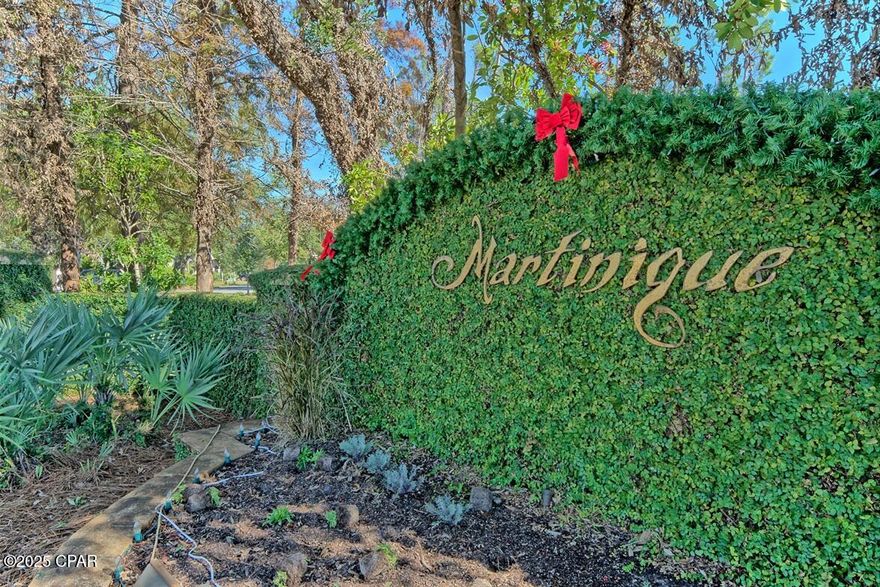 Fully renovated luxurious West Indies Home in exclusive Martinique in Panama City Beach. This large, fully renovated home features a tremendous number of high end designer upgrades. The crisp white kitchen cabinets pair beautifully with the exquisite new quartz counters and stainless steel appliances. The main floor of the home features beautiful hand scraped mahogany flooring and the primary bath has unique, hand painted custom floor tiles. The exterior of the home has been newly painted with a fantastic gray color scheme that compliments the architectural design of the exterior. Inside the home you will find a newly painted interior with a complementary palette of neutral grays and whites.

The first level was reconfigured to feature a second kitchen and can function as seperate living quarters. The main living area of the first floor features beautiful, pure white coffered ceilings and high end Monte Carlo ceiling fans as well as LED lighting. High end Monte Carlo ceiling fans are also featured on the main level. All interior and exterior lighting as well as outdoor landscape lighting is brand new. All of the carpeting in each of the bedrooms is brand new. The primary bathroom was reconfigured and features a free standing bathtub, luxury shower with custom tile work, a water closet and dual vanities with new quartz counter tops. Each of the main level bedrooms features access to an outdoor balcony for enjoying morning coffee or taking in the star filled nighttime sky. The garage floor has new epoxy coating and shines like a showroom floor. There is also room for a workshop in the rear of the gigantic garage. The home features two HVAC systems and both are brand new. The main level HVAC was upgraded to a 5.5 ton unit and the secondary level has a 3.5 ton unit. The paver drive was expanded to accommodate additional vehicles and the rear paver patio was expanded and features a beautiful outdoor fire place and hot tub for 5 people. Extensive landscaping costing in excess of $25,000 has been completed including the installation of a large underground drain system and the reclamation and installation of the sodded yard area behind the outdoor fireplace. There is room for an inground pool. The home has whole house sound and intercom.  New plantation shutters have just been installed on the interior.