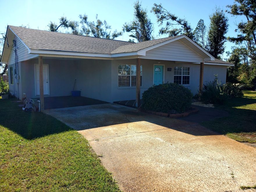 ** 2 HOMES 2 NEW ROOFs**2 ADDRESSES 

 2 ELECTRIC SERVICES 2 WATER METERS 2 ENTRANCES on a lovely secluded corner lot just under 1/2 acre.  The property is surrounded by privacy fencing with large gate entries from both E 6th St and Kirklin Ave. in the up and coming Millville community.  This multi-family property is great for extended family or rental income & is located near hospitals, churches, schools and shopping.Once inside the private compound, the overall feeling is like you own a resort with lush landscaping including variegated monkey grass, rosemary, ferns, palms and various ground covers.  Both homes are in great condition and well maintianed with recent renovations. Home #1 has 1770sqft  3 bedroom 2 bath split floor plan with great open common areas. The home has easy to maintain tile flooring throughout, oversized remodeled bathrooms includes a fresh bright remodeled kitchen with decorative tile backsplash, custom island and beautiful stainless steel appliances.  The kitchen and master bathroom are certainly highlights in this fabulous home.  The modern cabinets and tile work are a unique and tasteful twist.  PLUS The 10'x10' screened patio enhances your outdoor living and provides a place for laid back relaxation.  2 large storage buildings keep clutter at bay and tools tucked away.  Home #2 has 820 sqft 2 bedroom 1 bath with a large platform deck off the back overlooking a patio and firepit.  All tile flooring, solid countertops and cabinets, hall linen closet, washer/dryer, new water heater, central air and heat in this newly built home.  There is a respectable distance between the 2 homes with strategically place entrances and buffers for utmost privacy.  Both homes have large concrete parking areas.  The property is NOT in a flood zone, has a deep well and sprinkler system.