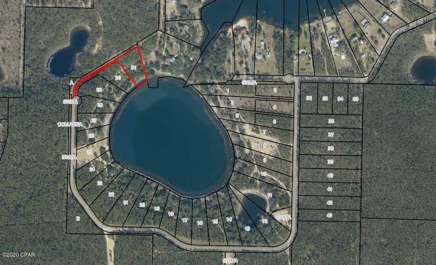 BREAM POND 1.58 ACRE WATERFRONT LOT-This is a Dream Property in a secluded and serene subdivision with natural surroundings and the beautiful spring fed Bream Pond in Northern Bay County. All 1+ acre lots and many large trees on each lot. This property is about 1/2 mile East of Hwy 77 and 1/2 mile South of Hwy 20 making it a very convenient location. Bream Pond is a Beautiful approximately 30 Acre Lake that is known for its fishing. It has clean clear water and a white sand lake bottom making it a desirable Lake for swimming, kayaking and other water activities.