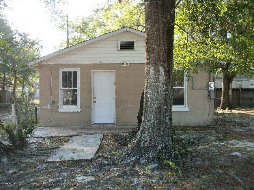 Age, square footage and lot measurements are approximate.  Taken from Property Appraiser's site.  There are four rent-able units.  Two are rented for $450/month, one is rented for $400/month, and one for $495/month.  Tenants pay all utilities.  One one bedroom extra unit structure is available for remodel.  Burned inside in early 2016.  Needs windows, wiring, complete interior redo.  This unit is 520 SF.  The above square footage includes a 400 SF detached garage/workshop. Roofs are less than 10 years old.  Units were rewired within the last 10 years.  Units are older and need some work.  There is available room on the site for an additional cottage or two.