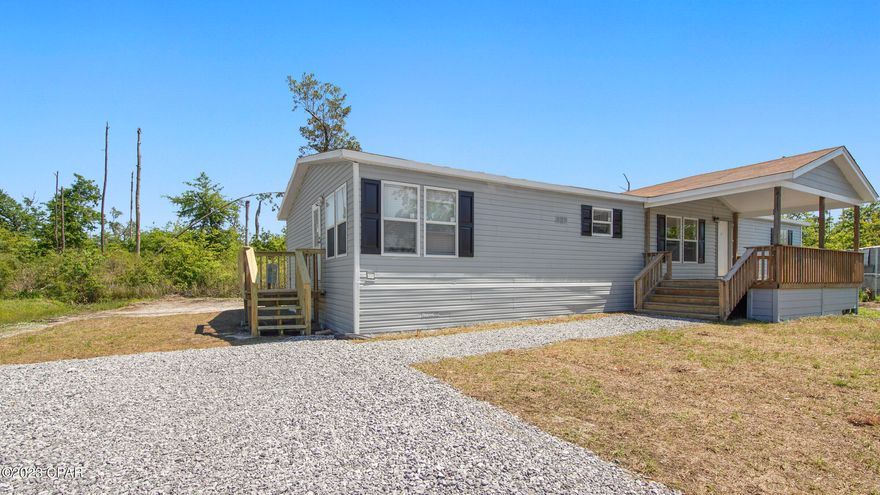 Motivated Seller! This beautifully remodeled 3-bedroom mobile home is located in Callaway, Florida, on 1/5 Acre and is a must-see for anyone looking for a spacious and modern living space. With a sleek and contemporary design, this home has been thoughtfully updated with new fixtures and finishes throughout.

The kitchen has been completely remodeled as a house and boasts new countertops, stainless steel appliances, galley style kitchen and gallery fridge with ample cabinet space for all your storage needs. 

Outside, you'll love the large covered porch area, and back deck which is perfect for enjoying the beautiful Florida weather. The home also has a spacious yard and plenty of parking for your vehicles.

This remodeled mobile home offers a comfortable and convenient lifestyle, with easy access to all the amenities of Callaway, TAFB, and Panama City Beach.

The lot next door is also for sale. Mobile financing is available, please contact agent for details if needed.
