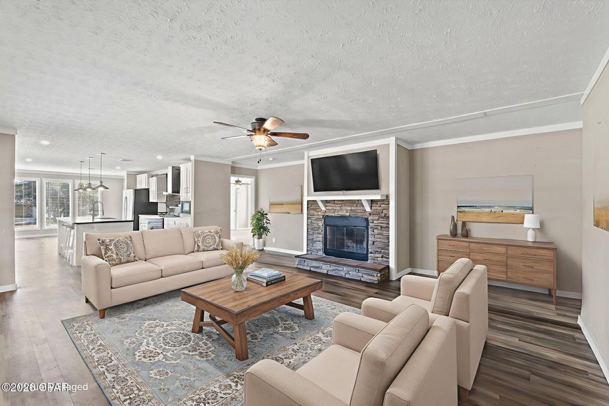 Situated on a beautifully cleared 2-ACRE LOT, this 2022 three-bedroom, two-bath manufactured home offers the perfect blend of space, privacy, and modern comfort. Set along a quiet road with mature trees, the property provides a tranquil country setting with endless opportunities for outdoor living, gardening, or future additions.

The home features 1,800 square feet of open-concept living, with the living room, kitchen, and dining area flowing seamlessly together. The kitchen includes a large island with bar seating, stainless steel appliances, and ample countertop space—ideal for everyday living and entertaining. 

Designed with a split floor plan, the spacious primary suite offers an oversized ensuite bathroom with a soaking tub and walk-in shower and walk-in closet. Two additional bedrooms and a second full bath provide flexibility for guests, family, or a home office. Additionally this property comes with a new roomy shed that has to lofts, great for lawn tools or additional storage. 

If you're searching tranquility and acreage with privacy, room to roam, and a move-in-ready home, this property delivers that opportunity! Schedule your private showing today!