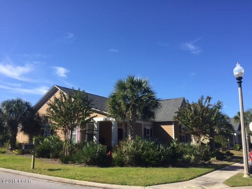 IMMACULATE CONDITION.  This little jewel is tucked quietly into a beautiful corner lot with mature landscaping affording PRIVACY on both the front porch and back yard areas. The spacious open plan provides plenty of room for entertaining while the SPLIT BEDROOM plan offers an opportunity to get away!  Upgrades galore including crown molding, granite countertops, stainless steel appliances, garden tub, Rinnai tankless water heater (gas), home energy monitor system, 14 Seer Air conditioner and much more. Enjoy the many amenities of this CHARMING LAKESIDE COMMUNITY including large lakeside pool, tennis courts, fitness center and clubhouse.  You will know ''This is the One'' when you step through the door!