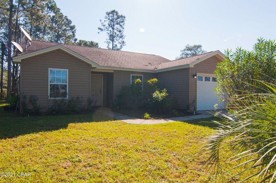 This little house is neat as a pin!  It shows pride of ownership at every corner.  Constructed with vinyl siding, this home is built to last.  Extra wide foyer provides plenty of room and opens to a large family room with lots of light, vaulted ceilings and beautiful built ins.  The kitchen and dining are open to the family room so the cook never has to feel left out!  The 2 front bedrooms are spacious and have good storage closets.  The master suite is at the back of the house, and features a private bath with roll in shower and walk in closet.  Lots of storage available in the detached workshop out back.  Come see this one today!