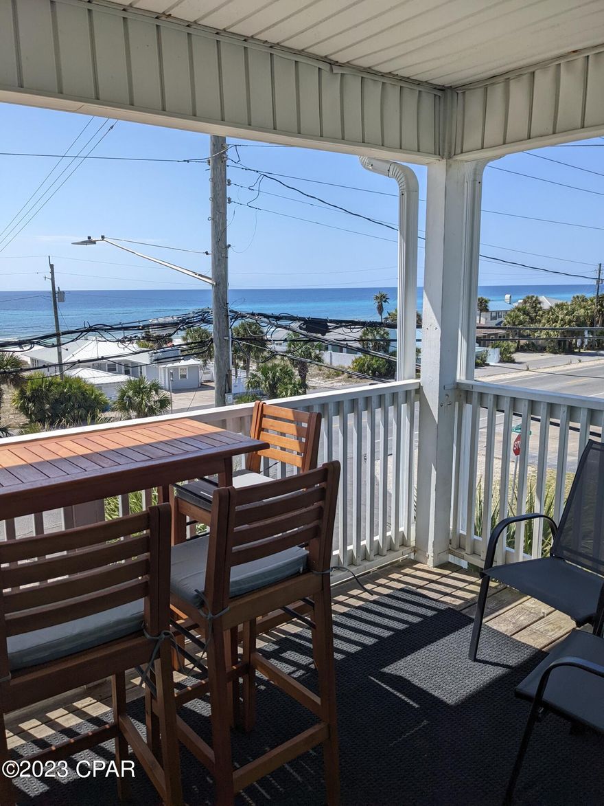 'CURRENTLY UNDER CONTRACT, SELLER WILL CONSIDER BACKUP OFFERS

Gulf facing, remodeled, low density condo, directly across the street from the Beach. This unit was remodeled in 2022 and features new stainless steel appliances, quartz counters, new cabinets, new windows and slider, LVP floors and remodeled bathrooms. The AC was replaced in March of 2023 and all appliances were new in spring of 2022, including the combo washer and dryer, water heater was new spring of 2022. Unit offers two dedicated covered parking spaces. And an observation deck on top for owners. All furniture, linens and kitchen tools are included. This unit is truly a rental machine. It grossed 50k from April [when it came online] to December of 2022 on Air BNB and has 37k in bookings for 2023 through July 31st 2023. The unit has a 4.97 on 66 reviews as of this listing. This small HOA keeps things easy. The HOA fee includes water, cable and trash. The building was recently painted, and the driveway repaved. The roof was redone after hurricane Michael.