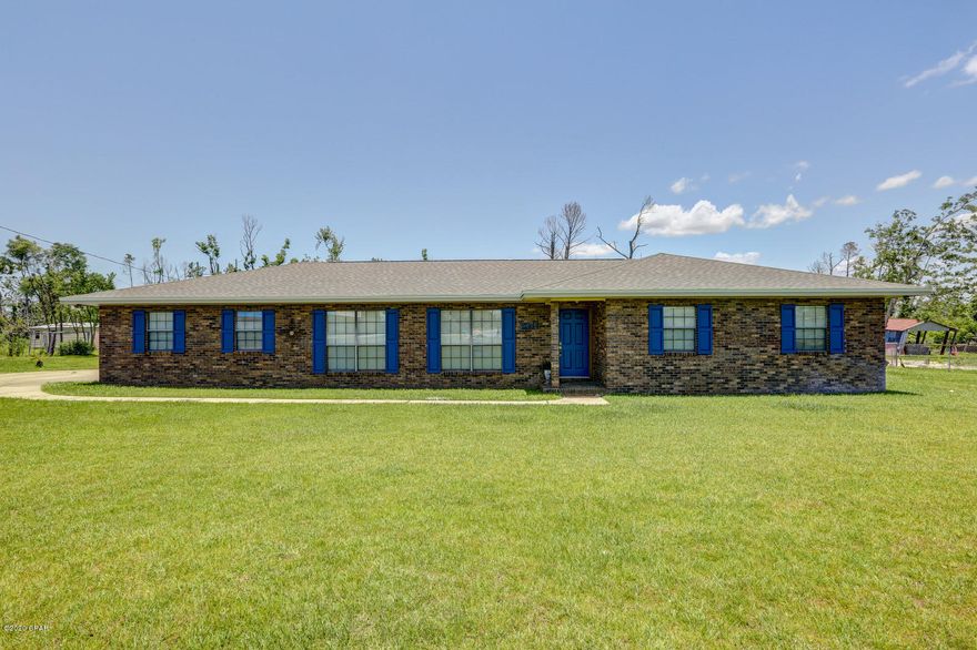 Under Contract Seller Accepting Backup Offers-NEW ROOF, HVAC, Hot Water Heater & flooring <2 years old. Home Had Minimal Hurricane Damage, but did receive a NEW Roof & New back porch columns. Meticulously Maintained, Move-In Ready 3 Spacious Bedrooms & 2 Full Baths Located on 1.92 Acres in a Great location close to everything! This wonderful home features 2 Living room Areas, Open kitchen with lots of cabinet space, all appliances less than 4 years old! One living room is located near the dining room area & there is another living room with wood burning fireplace & solid wood mantle. The Master Suite has a private bath with double vanity sinks! There are also 2 large additional bedroom & a full bath. The laundry room has a utility sink, storage closet & even a doggy door leading to backyar Dining room features is a Collectors Edition Thomas Jefferson Chandelier in Dining Room, built in brick charcoal grill in the backyard & the home comes with a new stainless steal gas grill! you have everything you need to entertain in this 1.92 acre backyard with covered back porch! ***please verify measurements if needed MAKE OFFERS MOTIVATED SELLERS!