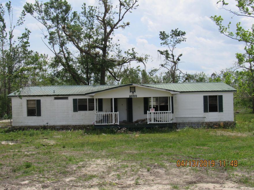 READY to be completed. Seller started remodel before hurricane and has since decided to sell. with two wells and two power poles on over 5 Acres of land makes this a great investment. Bring your RV while you complete the remodel on this open concept floorplan. Property comes with three storage sheds. Downed trees have been cleaned up and yard is ready to be landscaped. Small hole in one corner of the home where a tree branch poked through. Great adventure for someone who is not afraid to pick up a hammer and role up your sleeves. Not many places to get 5 acres of land in Panama City limits. Quiet location and close to all the fun. Call today for your private showing.