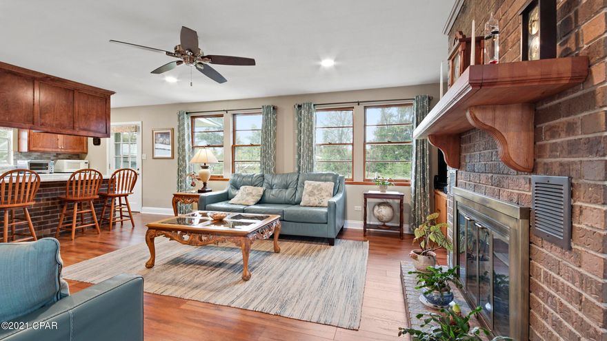 GREAT INVESTMENT OR PRIMARY RESIDENCE! The property is within one lot of being directly on 23rd St. and fronting on Michigan Ave. The 3 bedroom home with an efficiency apartment above the garage would allow for income while you decide how to develope this parcel. The property has City sewage at the road in front of the parcel and a large parcel that could accommodate multi residential homesites . Commercial C-3 zoning is approved under the future land use map. During the mean time generate up to $2,500 to $3,000 of immediate income. GREAT FUTURE INVESTMENT SIGHT.