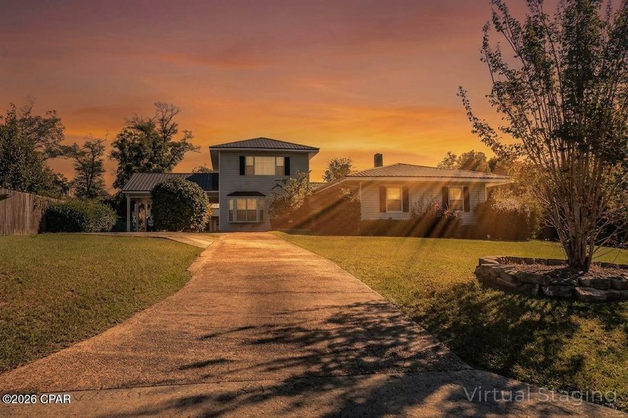 Charming four bedroom, two bathroom home in the town of Marianna offers a spacious, versatile floor plan ideal for family life. The large living area is flooded with natural light from expansive windows, creating a welcoming space for everyday living and entertaining. A cozy den provides an extra retreat for study, media, or casual hosting. The home features an upstairs master suite for privacy and comfort, with additional bedrooms that adapt to your needs. The heart of the home is a generous kitchen, connected to a formal dining room and a sunny breakfast room—perfect for family meals and weekend gatherings. Outside, a practical two-car carport protects vehicles, while a storage building and a storage barn add abundant storage options. This property combines convenient in-town location with generous living spaces and functional amenities.