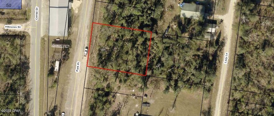 Over a quarter of an acre double lot located just off of Highway 231. This would be a great lot to develop and build a house or place a mobile home. Less than an hour to Panama City Beach or Mexico Beach. Right across from the Fire Dept. and right around the corner from the Dollar General and Piggly Wiggly.