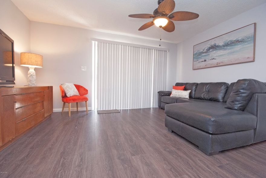 Renovated unit in Horizon South! 2 bedrooms 2.5 bathrooms and 3 outdoor spaces! This townhouse features a patio out back with beautiful decorative tile and an oversized deck off the upstairs bedroom along with a private balcony off the master bedroom. New flooring, new paint, new lighting and updated master bedroom and upstairs bathrooms! The kitchen was remodeled in 2016 and the decor has just been updated to a very cute beachy look! Horizon South is a family oriented complex! It is located on the quiet West End across the street from the gulf with an easy beach access. This complex offers 4 Pools, one heated (Winter Only), kiddy pool, Tennis Courts, Shuffleboard and Mini Golf. **All measurements are approximate, if important, please verify*