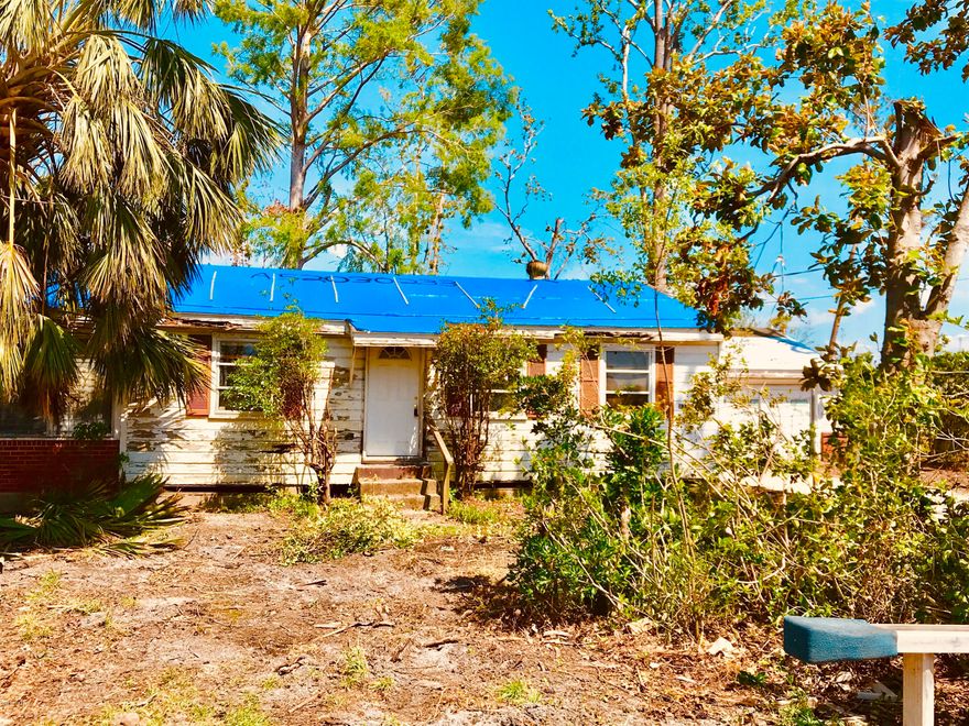 Turn your insurance money into equity! Here's a great opportunity to pick up an affordable home on a quiet, well-maintained street in Lynn Haven.  This 3 bedroom 1 bath bungalow sits on a large, 1/3 acre lot and boasts a 2 car garage.  The den has a fireplace and there is a Florida room on the rear.  (Buyer to inspect and verify any info that is important. Property To be sold As Is, Seller will make no repairs, nor pay for any repairs. Property to be sold AS IS, Cash.)