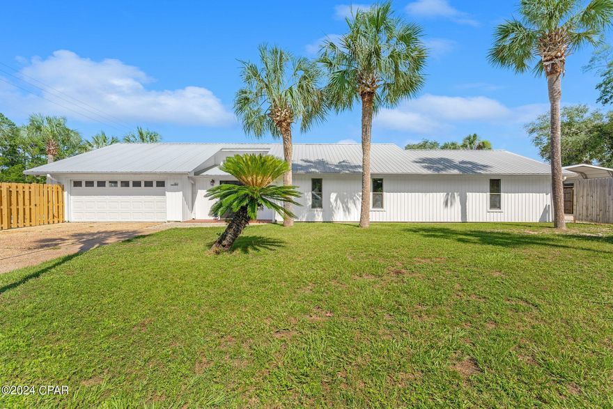 Beach Lovers and Investors, are you looking for the perfect beach home or dual income producing property? This unique and charming coastal property boasts a 3 bed/2 bath main home with 2 car garage and private saltwater pool as well as a 1 bed/1 bath mother-in-law suite with full kitchen, private entrance and separate covered driveway. 

Nestled in a serene neighborhood just moments away from the Gulf of Mexico. As you approach this address, you'll be greeted by a picturesque street, lined with swaying palm trees and well-manicured lawns. The house itself exudes a welcoming vibe with its brand-new white board and batten exterior and cozy front porch, perfect for enjoying the warm Florida breeze. Stepping inside, you'll find a spacious open-concept layout filled with natural light, new flooring, new light fixtures and new appliances.

The interior decor is a seamless blend of modern elegance and coastal charm, featuring soothing hues of blue and beige complemented by nautical accents. The living room is a comfortable retreat with plush sofas and a fireplace, ideal for cozying up on cooler evenings. The seller can accommodate investors who would like to purchase existing furnishings for a turn key rental.

Outdoors, the property is a haven for relaxation and entertainment. The spacious backyard features a pristine saltwater swimming pool surrounded by loungers and umbrellas, perfect for soaking up the sun or taking a refreshing dip on hot summer days. A covered patio area with a barbecue grill offers the ideal setting for al fresco dining and gathering with friends and family.

This property truly embodies the essence of coastal living, offering a perfect blend of comfort, style, and tranquility in one of Florida's most sought-after destinations.

Listing agent has equitable interest in property.