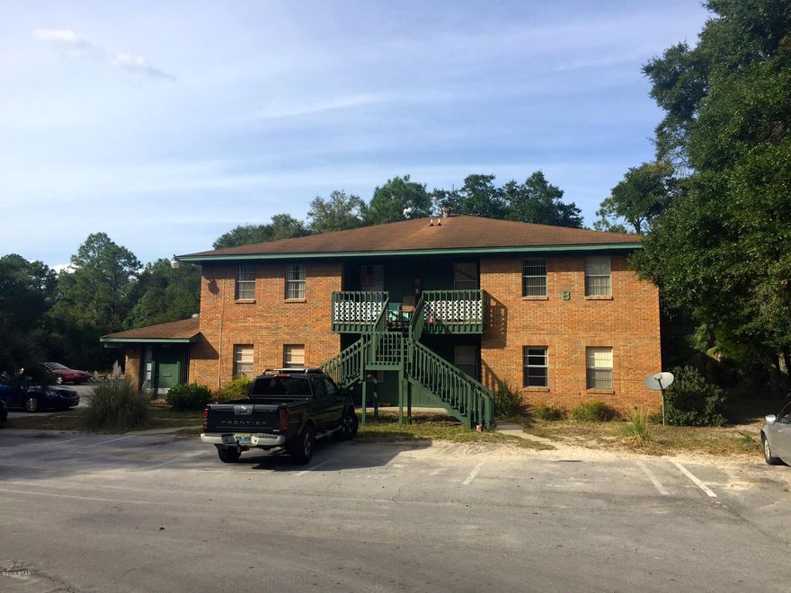 Oakmont Apartments - 3 parcels priced $200K below appraised value.  14 2BR/1BA units and 1 small office with 1BA.  100% occupancy.  Bldg A built in 1981, 5454 sqft, 6 units, .50 acre.  Bldg B built in 1983, 7664 sqft, 8 units, .84 acre.  2.12 acre vacant land zoned Mixed Use Three also included.  Mixed Use Three allows single family, duplex, triplex, quadraplex and apartments-twenty units per acre.  All units rented at $600/mo, generating $8,400 in gross monthly income.  Units contain, fridge, stove/oven, microwave, dishwasher & washer/dryer hook-ups.  Property appraised at $1.2 million in July 2015.