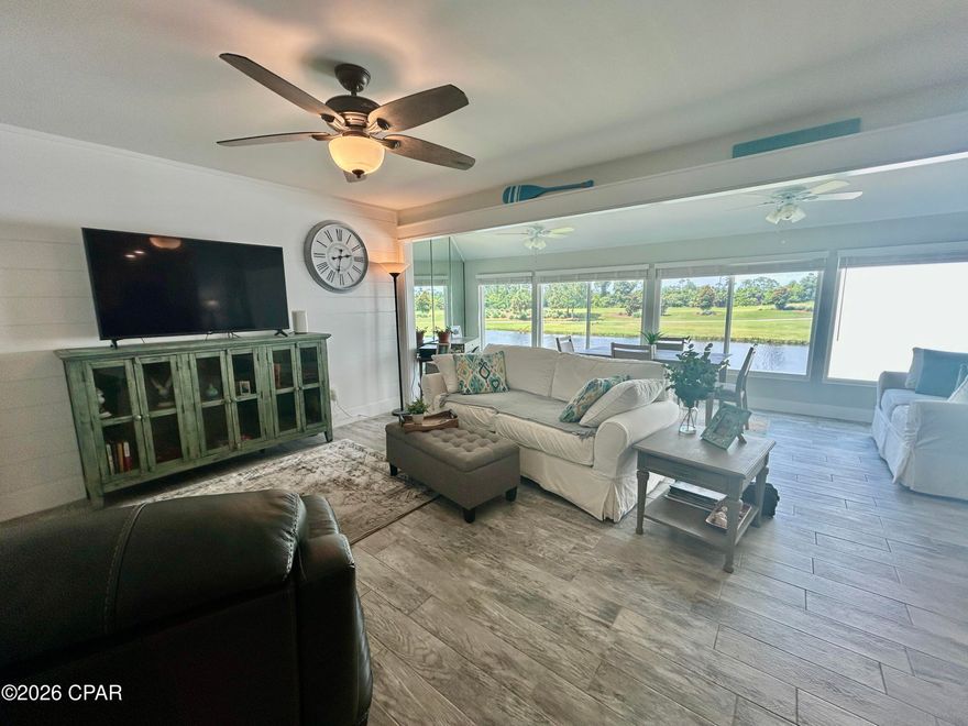 Welcome to your serene retreat in Bay Point, one of the most exclusive gated communities in the area! This beautifully updated 1 BR/1BA condo overlooks a peaceful lake along the renowned Jack Nicklaus golf course and sits just across from the new state-of-the-art South Point Marina on Grand Lagoon. Enjoy quiet mornings with wildlife views in a secure, 24-hour gated community that feels like a world away. Inside, you'll find stylish upgrades throughout--including Shiplap Accents, Sliding Barn Doors, Tile Plank Flooring, 2 Pantries, Quartz countertops and a 6' Long Kitchen Island. The entire condo was completely renovated in 2019. All appliances, including the HVAC and front-load washer/dryer, are less than six years old. The HVAC includes UV Air Purifier. Perfect for full-time living, a weekend escape, or a low-maintenance investment in a premier coastal community, with 2 restaurants in the community. The dimensions are estimated. Measure if important.