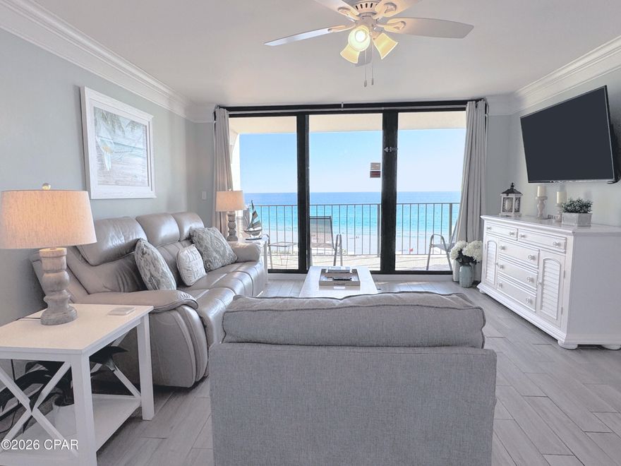 The ultimate coastal luxury retreat or rental investment opportunity! This stunning, newly listed 7th floor condo at Edgewater Beach Resort is in vibrant Panama City Beach, Florida. An immaculate property that was meticulously remodeled from the studs up in 2022, showcasing exquisite upgrades throughout. Step inside to discover premium tile plank flooring, elegant wide trim and crown molding, designer lighting, and smooth ceilings that create an airy, inviting ambience. The show stopping kitchen has been opened and features custom cabinetry, gorgeous quartz countertops, ceiling and lighting upgrade, and stainless appliances. This floor plan highlights a sought-after Gulf-front bedroom with beach views, floor-to-ceiling windows, and a private balcony for savoring sunset skies and the soothing sound of ocean waves. The spa-inspired owners bathroom boasts a modern tile shower and upscale fixtures. Every detail has been considered for comfort and style, including new doors, contemporary furnishings, a high-efficiency water heater, and AC system. Exclusive access to beaches, pools, hot tubs, restaurant, market, pickleball, tennis, fitness center, golf+pro shop, kids splash pad, game room--all within a gated, beautifully maintained resort. Convenient building-side parking, vehicle charging, and parking for RVs, boats, jet skis, trailers. Pet-friendly for owners, with both the dog beach and park just minutes away. Whether you're searching for a personal family retreat, an active second home, or a high-performing rental property, this exceptional residence delivers the beach lifestyle you've dreamed of.