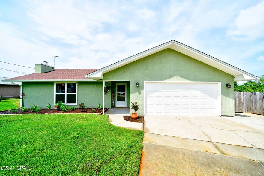 Located on Lake Charles close to Tyndall AFB, this home has a great open floor plan, New AC, new natural wood cabinetry in the kitchen, and all new appliances. The sunken living room showcases a beautiful wood burning fireplace. New Luxury Vinyl Plank throughout, as well as all new lighting, windows and doors. In the generously sized, and well landscaped yard there is a 12' x 16' shed/workshop. And to top it all off there is a dock where turtles feed daily.

  The large 13' x 25' screened porch with double ceiling fans allows outdoor living with a breeze, where houseplants thrive shaded from the sun. Home comes with a parking pad and plenty of room for a large RV, also includes SEWER and 50 AMP and electric hookups. Seller has installed new gutters and French drains.