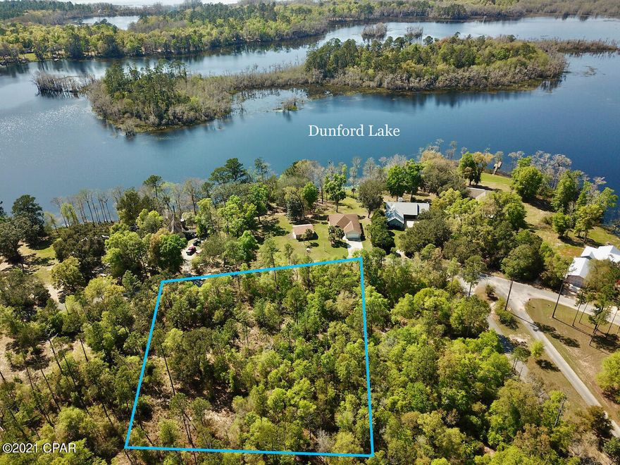 The name says it all! This huge lot, over 1.5 acres nestled in the ever popular Paradise Lakes subdivision is ready to be the location of your new dream home. Being walking distance to Dunford Lake, which is approximately 250 acre spring fed lake! Plenty of Largemouth Bass, Catfish and Bream swim the clean and clear waters. Boats are allowed on the lake with up to 25 HP motors or 15 MPH max speed. This tranquil community has low association fees, underground utilities, community boat ramp and paved roads. Deed restrictions will allow a minimum of 840 sq ft for single family dwelling and no mobile home or travel trailer living is allowed. Paradise Lakes is a gated community approximately 35 miles from Panama City Beach and Pier Park! This property won't last long!