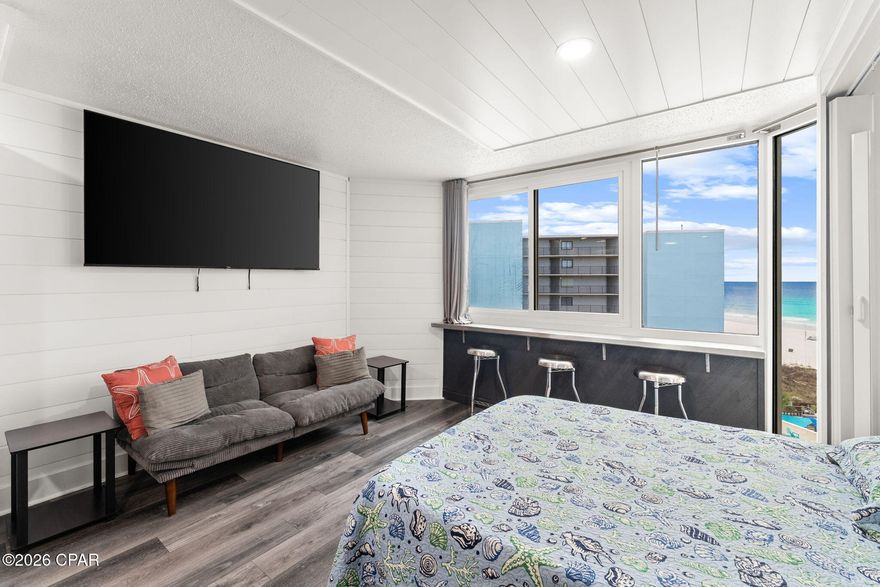 Back ''On The Market Better '' Best Opportunity in Panama City Beach. Owner says: ''Sell It'' -Its Priced to sell!! Directly on the Beach. Gulf Front-Gulf of Mexico, Ocean and Sunset Views, Pool Side. Directly from your new condo to the beach-With a quality Recent renovation. Live here full time, have it for your friends and family, use it as a short- or long-term rental investment.   Amenities: wi-fi, owners lounge, large gulf side pool, kiddie pool, game room, fitness center, BBQ, and picnic areas, beach showers poolside snack bar... Owner pet friendly. Dues that includes water, cable, internet, parking and much more. This building is short term and long term rental friendly! A safe community on the Iconic Thomas Drive, that is rich with activities and diversions. No special assessments! A true paradise, on the 6th floor. It is the only unit currently for sale at Top of The Gulf that has an ocean views from both sides of the building!  Income opportunity is better than cash in the bank. Priced for quick sale!