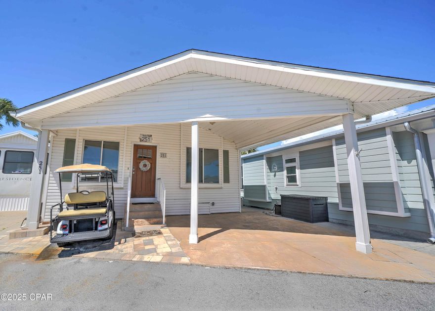 Check out this stunning Venture Out home! The beauty backs up to a common ground giving you that outdoor space you will love. This home has updated flooring, paint, granite countertops and will be sold completely furnished with a golf cart.  This is one is turnkey and ready for you! Venture Out is a golf cart community that has exploded with popularity recently... With 300' on the beautiful pristine beaches of the Gulf of Mexico and 1,000' on the Grand Lagoon. Venture Out has something for everyone. With 2 pools, fishing pier, boat ramp, mini golf, children's play ground and much much more!