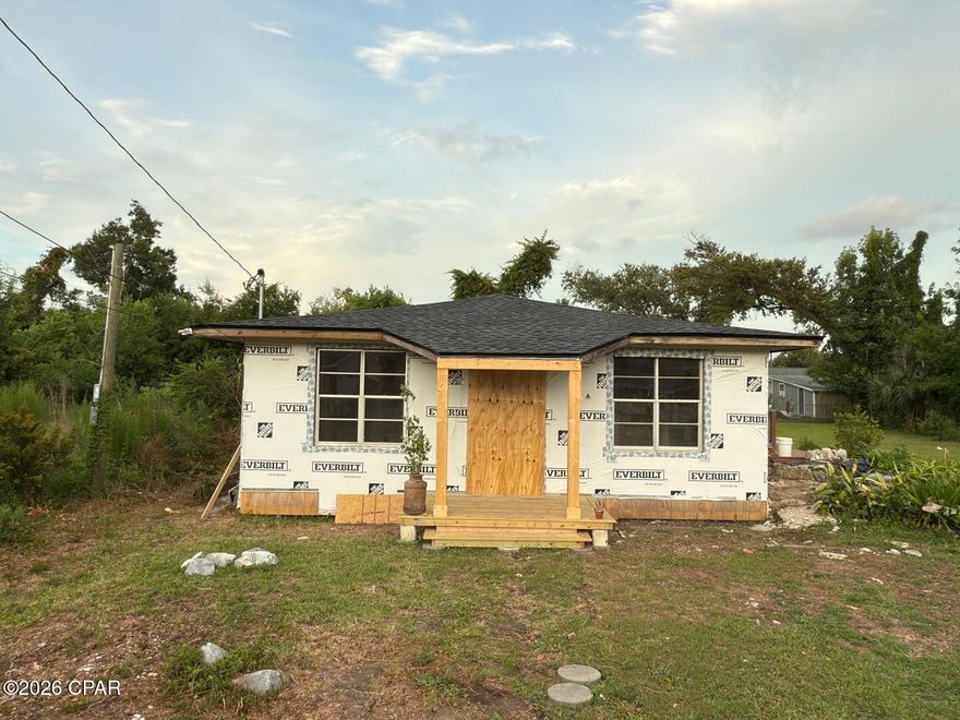 Unfinisshed business opportunity. New ceiling, new electrical wiring, bathroom is finished with new plumbing. The rest is up to your imagination.  Zoned MU-2  (buyer to verify)  Good commercial rental, fix and flip, or use as desired.  Sold AS IS