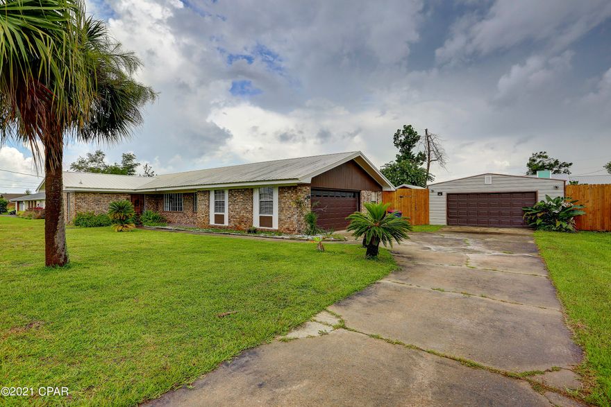 CURRENTLY UNDER CONTRACT, SELLER ACCEPTING BACKUP OFFERS. Beautiful 3 bedroom, 2 bathroom home located in the highly desirable area of Pretty Bayou. TWO  separate garage spaces, park two vehicles in the attached garage all your boats, toys and more in the second detached garage. Tall privacy fences enclose a spacious back yard that offers two sheds for man cave, she-shed or additional storage. Enjoy the mature citrus trees and more beautiful flowering trees in this comfortable back yard. All new insulation installed throughout on 8/1/21. See it now! All Measurements to be verified by Buyer if Deemed important.