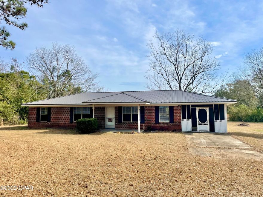 Brick home on a slab located on an acre at the end of a dead-end street in the country. Have you been looking for peace and quiet? This is it! The home has a one-year-old metal roof, new linoleum, lvp flooring, carpet in the bedrooms. 1,200 gallon septic system. Inside the home features a formal dining room, living room, kitchen open to a large dining area. Watch deer from your sliding doors that open up to the large backyard. The carport was converted to a screened area and the laundry room is located just off the kitchen accessed via the screened room. Home has some updates, but also has some original aspects still. There is an outside heat pump, but it does need the inside unit still. Cash or conventional financing only- sold as-is.