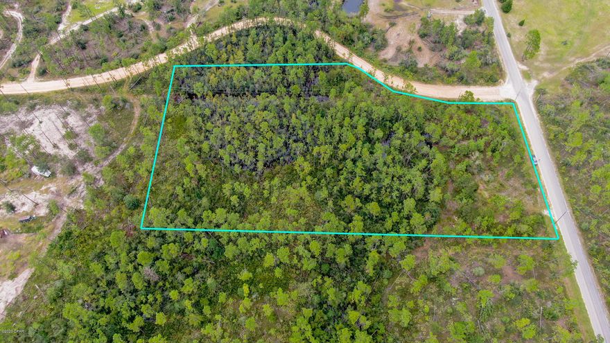 UNDER CONTRACT, SELLER ACCEPTING BACK UP OFFERS. .... PAVED ROADS!!! Looking for a little Country? Smooth sailing on the road access to this lovely 5 acre parcel of land in Fountain. Pond on the rear of the property, front is high and dry! Perfect for a mini-farm or hunter's paradise. I'm sure the wildlife is abundant with the pond!  Corner property and paved road access makes getting in and out a breeze! Definitely not one to pass up... Priced to sell! (all sizes approximate and taken from public records, buyer to verify any details buyer deems important).