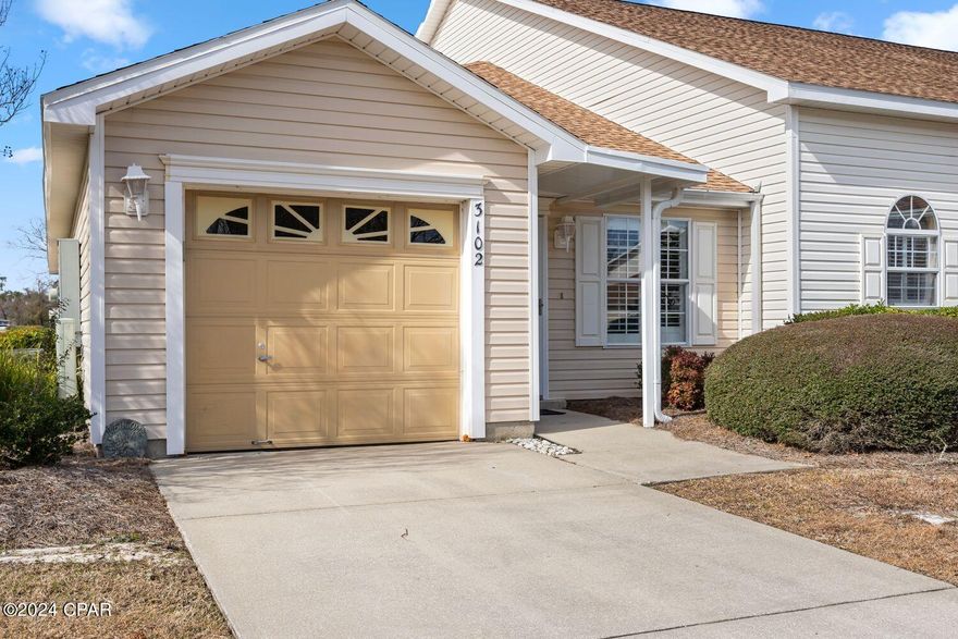 CURRENTLY UNDER CONTRACT, SELLER WILL CONSIDER BACKUP OFFERS. Cute cozy and move-ready. This 2 bedroom 2 bath town home is perfect for the first time home buyer or someone looking to downsize. THIS IS AN END-UNIT with a large living room and dining room plus an eat-in kitchen featuring lots of cabinets and counter space. The kitchen includes new refrigerator, dishwasher, stove, large breakfast bar and pantry. The bedrooms are both spacious and the master bedroom features a walk-in closet along with another closet. The master bath has a brand new walk-in shower. There is a cozy screened-in patio overlooking a common landscaped area. This home had the roof replaced in 2018 along with new windows throughout. All of the flooring is tile and wood and the plantation shutters are a nice touch to bring in all the natural light. This home is kept immaculate and is a must see. The attached units in the Hammocks have full access to the pool across the street and all of the yard maintenance is taken care of.  This subdivision has sidewalks, street lights and is conveniently located near good schools and great shopping.