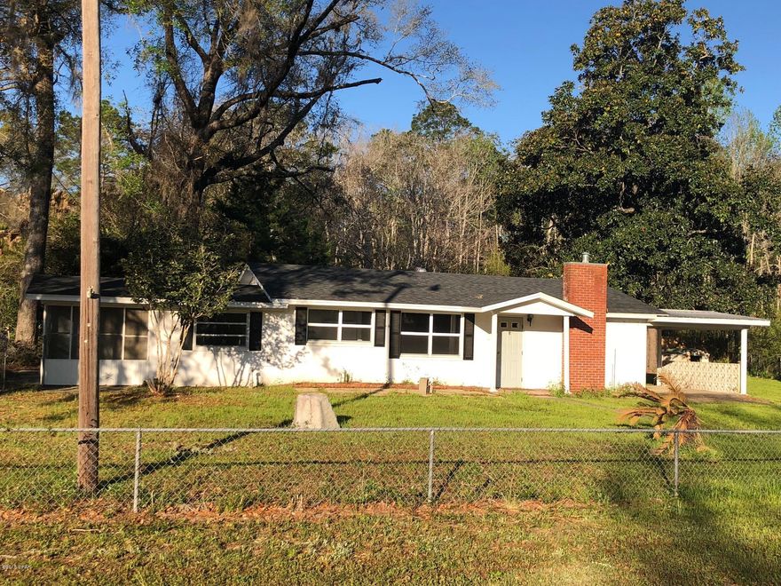 This nice 3 Bedroom 2 Bath block home has been updated in recent years with new counter tops, new paint, and bathroom fixtures. Nestled in a country setting with the benefit of paved highway. Located 45-50 minutes north of Panama City Beach and just minutes south of the I-10 Interchange in Caryville. This property is made up of 4 parcels of land with this home making up the 4.6 acres . Vacant lot that corners Pate Pond Rd and Mattox Springs rd is 2.96 acres. Property has 90 feet of waterfront on Pate Pond across the road from house. A Must see!