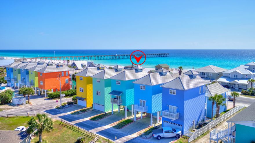 This incredible 3bed/3.5bath 3 story home is located across the street from PCB's only dog beach and next to the entrance to Pier Park. This home is immaculate and is offered turn-key rental ready. Rental income is excellent and seller will cooperate with new owner to transfer rental list. Home offers incredible Gulf views from third floor living area and balcony. Fully furnished, new durable Coretec Plus luxury vinyl flooring, only unit with covered balcony in back of house on 2nd floor & Some Wayne’s Coating.  It was developer’s house and it is tallest unit in Subdivision.  Located near Pier Park. 1 year Home Warranty. All measurements are approximate, Buyer verify if important.
