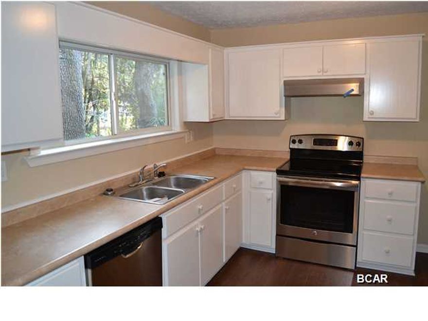 Ready to be in your NEW HOME for the NEW YEAR then come see this charming St. Andrews cottage that has just been completely rehabilitated! New roof! New Carpet! New Appliances! New exterior trim! New Paint! Seriously, just about everything in this home is NEW! Nice sized yard with over-sized carport with extra storage. All proceeds from this sale will benefit the Military Warriors Support Foundation. Contact a REALTOR for more information and to schedule a showing of this charming home in St. Andrews! All measurements are approximate and should be verified if important.