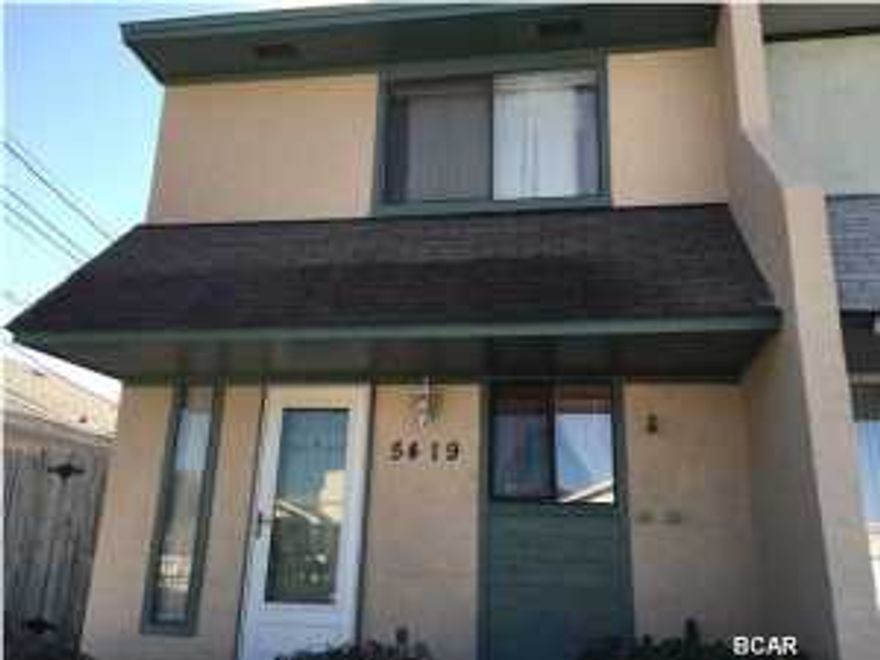 SHORT WALK TO THE BEACH! ONLY 2 1/2 BLOCKS..... NO HOMEOWNER FEES! This is an end unit which has an extra 5 feet plus side yard with gate and completely fenced in back yard. Complete renovation which includes a charming vessel sink, stainless steel appliances, new paint inside and out, carpet and light fixtures. All new plumbing throughout home, new fixtures and cabinets in both bathrooms; new tile floor in upstairs bathroom. New air conditioning and heating system. Home being sold unfurnished. This home is perfect for long or short term. MUST SEE!!! Age, dimensions and square feet approx.