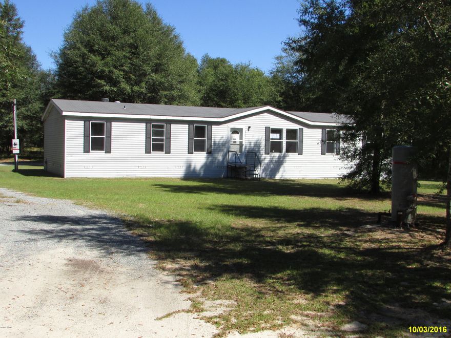 Looking for a Secluded Location?? Look no Further… Nice 4 bedroom 2 bath DWMH with 2026 sq ft located on 3 acres in a private setting. Open kitchen with center island and all appliances. Living room plus Family room with fireplace. Master bath has garden tub and shower. Split bedroom plan. Cal today for price. Will go Fast!