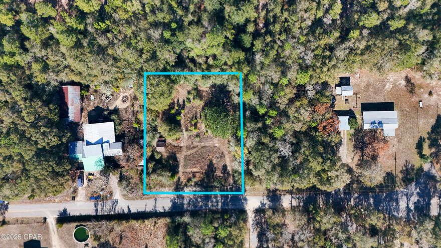 Endless possibilities await on this peaceful DeFuniak Springs lot! Nestled on a quiet cul-de-sac, enjoy country living with a well, septic tank, power pole, and a shed ready for your vision. Just a short drive to serene Juniper Lake and 10 minutes from downtown, shopping, dining, and I-10 access. This Flood Zone X lot is fenced and welcomes mobile homes, or build your dream home. This property is ready for your ideas. Shed needs TLC.