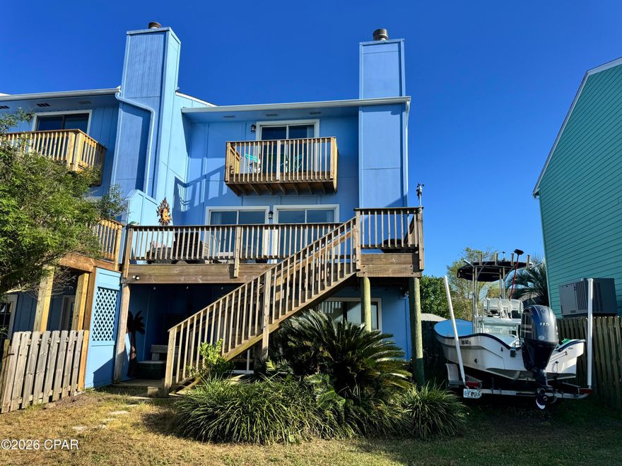 Welcome to your slice of coastal paradise in Gulf Breeze! This completely updated end-unit waterfront home at 3212 Quiet Water Lane is priced to move and delivers the perfect combination of modern upgrades, space, and unbeatable views.

Featuring 3 bedrooms, 2 bathrooms, and approximately 2,000 sq ft, plus a versatile bonus room downstairs, this home offers flexibility for a home office, guest space, or entertainment area. Inside, you'll find a fully renovated interior with updated flooring, modern fixtures, and a bright, open layout ideal for both everyday living and hosting guests. The kitchen shines with updated finishes and ample space to gather.

Step outside and experience the true highlight--breathtaking water views paired with a brand new seawall and a large dock extending over the water, perfect for relaxing, fishing, or enjoying the coastal lifestyle right from your backyard.

This desirable end unit provides added privacy, while the low annual HOA fee keeps ownership affordable and hassle-free.

Motivated seller = incredible opportunity. Whether you're looking for a primary residence, second home, or investment, this move-in-ready waterfront property checks all the boxes.

Conveniently located near top-rated schools, shopping, dining, and just minutes from the sugar-white beaches of the Gulf Coast.

Act fast--waterfront, updated, and priced to sell. Schedule your private showing today!