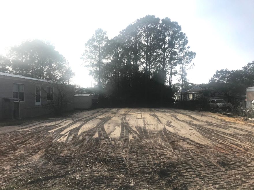 Beautiful cleared , with level dirt, Beach Lot; access to Twin Lakes and Front Beach Road entrance to the beach, Several new homes have already been built on this street. Need a builder; I can help you there too.