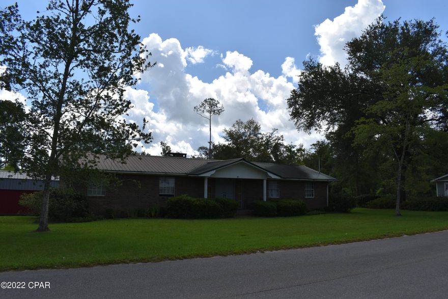 *********INVESTORS DON'T LET THIS ONE GET AWAY******** Come see this 3BR/2BA home in the city limits of Chipley. Features include an oversized kitchen with lots of cabinets and a breakfast bar that can be seen from the dining, and living room, large inside utility room, double front doors that lead into the living room, wood burning fireplace, nice size bedrooms and a one car garage.

Outside the double back doors there is a covered concrete deck,16x24 storage building, front porch to watch the cars go by, nice size yard and a beautiful big oak tree. Call today for an appointment to view it before its gone!!!!  Cash Only!!!!! !