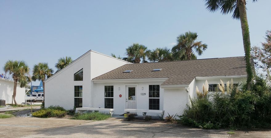 Recently remolded and ready for immediate occupancy! This building would be perfect for many uses; office, medical, or retail.  There is a large open space upon entry with beautiful high ceilings.  Floor plan  includes, conference room, three additional offices which could easily be converted to four or a break room.