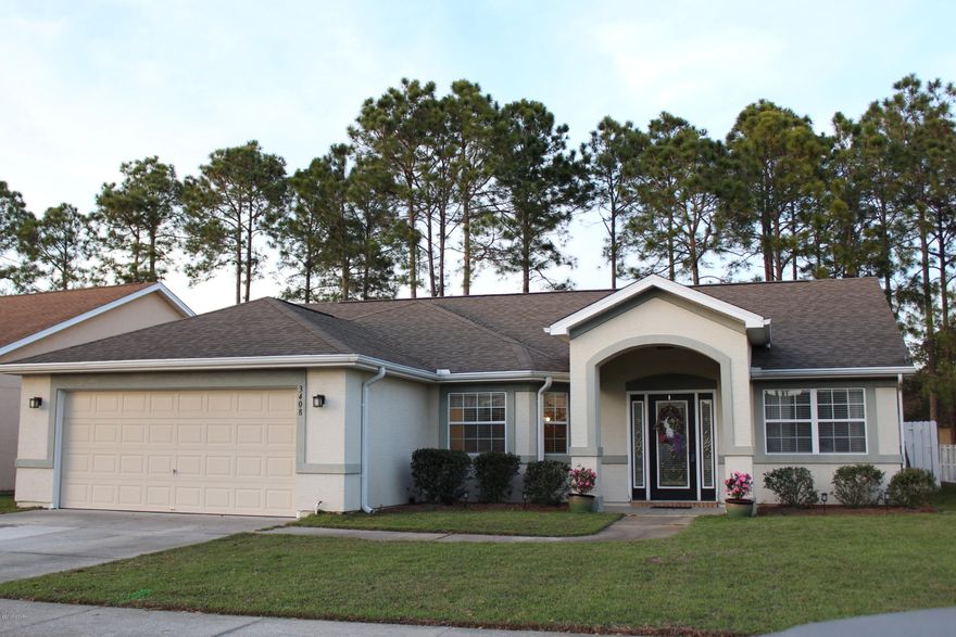 Pride in ownership is evident in this lovely home. Located in the popular Hammocks SD in Lynn Haven, this 3 bedroom, 2 bath home offers an open floor plan with split bedrooms.  The master bathroom was completely remodeled with a tiled, walk-in shower; double sinks; walk-in closet, new flooring, light fixtures, faucets and custom cabinetry. Kitchen updates include: tile flooring, dishwasher (2014), microwave (2015), and cabinetry. Living space has tiled floors. Bedrooms are carpeted. The master bedroom is spacious and the natural light throughout the home adds a delightful atmosphere.  A screened porch, brick patio and large, fenced backyard provide a perfect place for family time and great outdoor entertaining. Sprinkler system has a separate well.  Wonderful home, come see for yourself! Two car garage with work bench. Transferable termite bond.  Survey available.
No flood insurance required - X Flood Zone.  All measurements and dimensions are approximate and should be verified by the buyer.