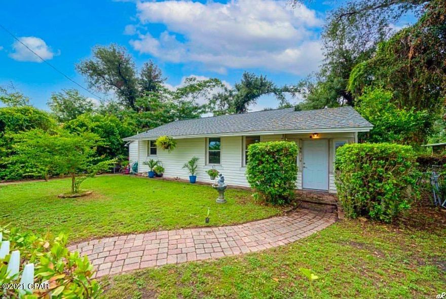 PRICE ENHANCEMENT!! Motivated Sellers. Cove Charmer just 2 blocks from the Bay and downtown.  It has 2 entrances you park out front or there is a street entrance through the back. Has large master bedroom with large walk-in closet. Has an office space and  large living room.  2 bath has a jacuzzi tub. It has a 20 by 16 large storage building out back. But how about an above ground pool with a deck and beautiful greenery.  If you been looking for a great starter home,a great investment or even looking for a second home but want to stay way from traffic this  street is quiet, friendly and quaint.  It's a cove home that  has potential! Close to all the great downtown activities.  Don't miss your chance.