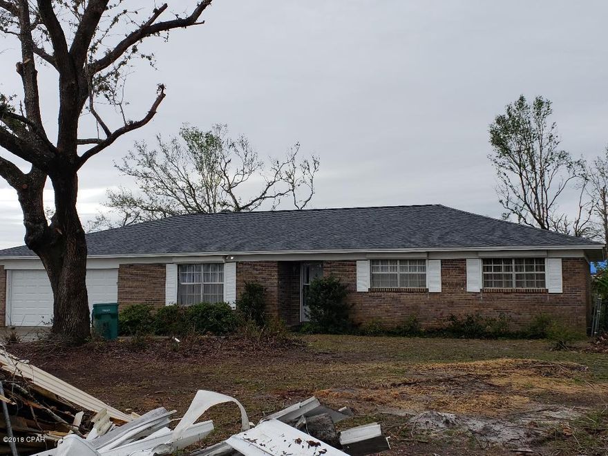 Home was damaged but repairs were made. New roof and fence. Very nice  home with a lap pool in the back yard close to Tyndall.