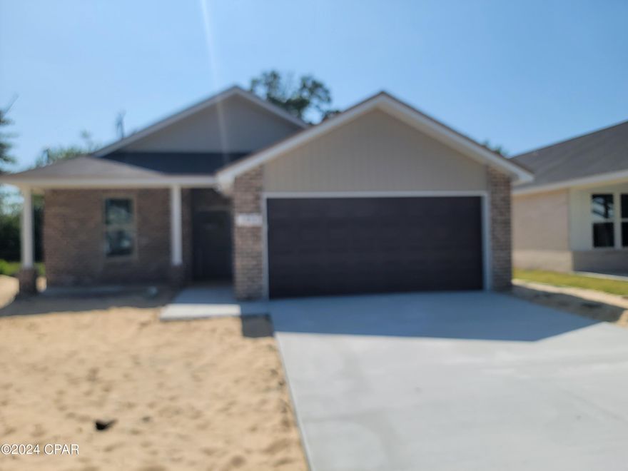 'CURRENTLY UNDER CONTRACT, SELLER WILL CONSIDER BACKUP OFFERS'  Beautiful three bedroom two bath home with open floor plan and raised ceilings in highly sought after Lynn Haven.  Large kitchen island with breakfast bar that can be great for entertaining.  Custom hand-crafted cabinets, Granite counter tops and LVP flooring.  Energy efficient home with vinyl windows and good cents insulation.  Landscaped yard with sprinkler system on an irrigation meter.  Construction nearly complete.  Come take a look.