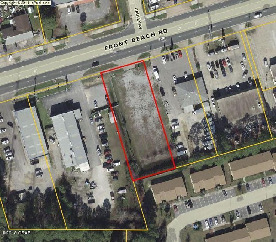 Cleared Commercial Lot on busy Front Beach Road - Ready for your business now!  This was a former insurance office location (bldg has been removed) so it already has the water connection, a sewer lift station, storm water management pond.  The entire site has been cleared and has gravel rock surface.  High visibility and traffic count at this location.  Close to Beach, amusements, Navy Base and colleges, and short drive over bridge to Panama City.