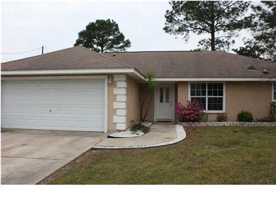 Great location to beaches yet in a quiet residential area. Home has large living area, dining area, and breakfast bar. Open floor plan with no wasted space. Split bedroom plan, Master suite has walk-in closet. Low maintenance, Stucco, and corian window sills. Converted garage into large Master Bedroom