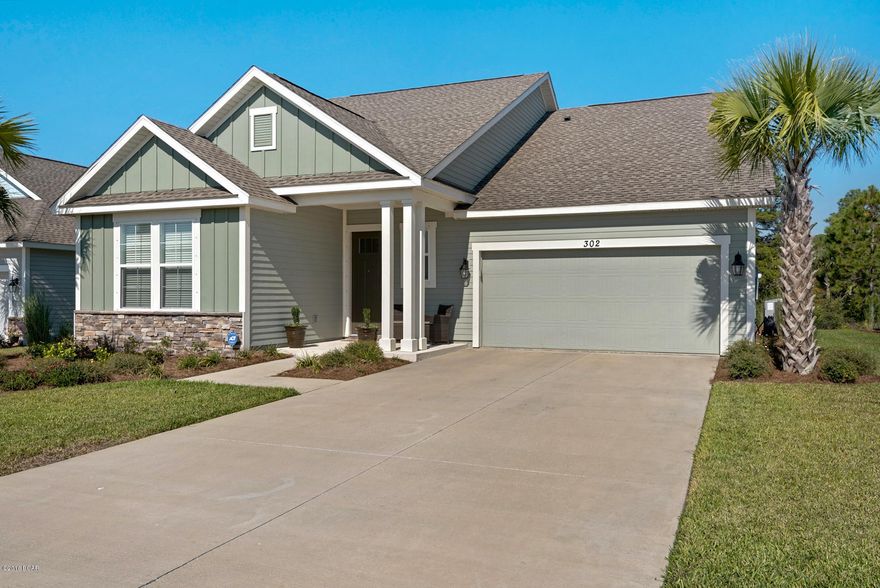 BETTER THAN NEW CONSTRUCTION in the desirable community of Whisper Dunes.  No need to wait 6 months to build, this house is in like new condition.  Numerous upgrades throughout including wood plank tile throughout entry, living area and kitchen, upgraded white kitchen cabinets with contemporary pulls, custom designed cabinets in laundry room with additional space for a refrigerator, oversized covered patio and security system.  Washer/Dryer and refrigerator included in sale.  HOA fees cover ALL yard maintenance.  Sellers have been relocated out of town.  Don't let this one get away!  .