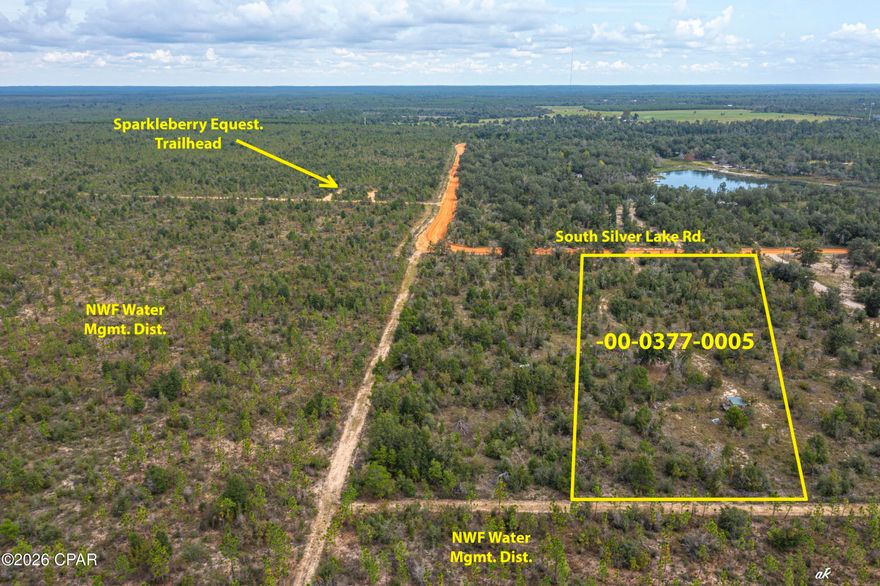 If privacy and seclusion are at the top of your list, this property delivers. This beautiful homesite spans approximately 165 feet wide by 660 feet deep, offering plenty of space to spread out and enjoy the outdoors. Direct access to endless recreation, hunting, horseback riding, hiking, and exploring right from your own backyard.

Step out your front door to saddle up and ride straight to Econfina Creek or Sparkleberry Pond for a true North Florida experience. The property is located on a county-maintained road just one mile from pavement, providing the perfect balance of accessibility and privacy. Plus, it's high and dry and ready for your vision.

Conveniently located just 6 miles from grocery and hardware stores and only 30 miles from Northwest Florida Beaches International Airport, you'll enjoy peaceful, rural living without sacrificing everyday necessities.

This is your chance to own a private slice of North Florida paradise.